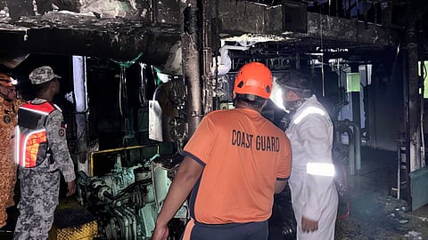 Philippine Coast Guard personnel inspect the burned-out engine room of the ferry Maria Felisa after a fire ignited on board on February 1, 2026. The vessel was en route to the Port of Lipata in Surigao del Norte province when the incident occurred.