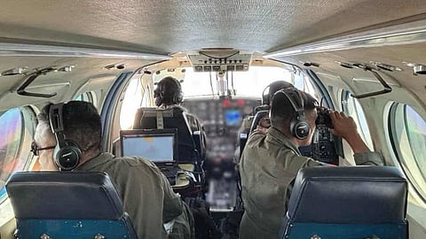 Aircrew aboard a Philippine Navy TC-90 maritime surveillance aircraft conduct a patrol of Indonesian waters in an attempt to locate any sign of the 14 missing passengers and crew of the recreational dive boat Amejara, January 30, 2026. Only one person was rescued after the boat capsized off Davao Occidental province in the southern Philippines eleven days prior.
