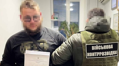 The suspect (left) following his arrest by Ukrainian authorities / Ukraine reports arrest of individual in possession of drone-related intelligence