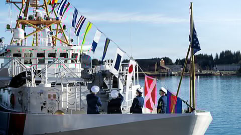 The US Coast Guard fast response cutter USCGC Frederick Mann displays signal flags after her commissioning ceremony at Coast Guard Base Kodiak, Alaska, February 13, 2026.