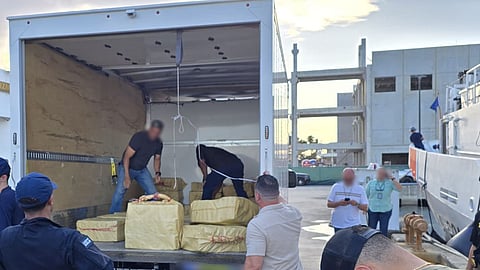 Personnel from the US Coast Guard and partner agencies offload drugs seized off Camuy, Puerto Rico, February 13, 2026. Coast guard law enforcement crews disrupted a drug trafficking go-fast vessel and seized US$13.3 million worth of narcotics.