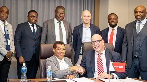 La Congolaise des Voies Maritimes Director General Jeanne Blandine Kawanda Walwom and Royal IHC Chief Operating Officer Bert Jan ter Riet shake hands following the signing of the dredger construction contract, March 10, 2026.