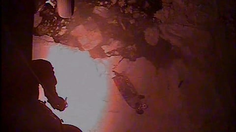 An MH-60 Jayhawk helicopter aircrew from Coast Guard Air Station Kodiak rescues three adults and one child from an 18-foot vessel trapped on an ice floe approximately 10 miles west of Chefornak, Alaska, April 14, 2026