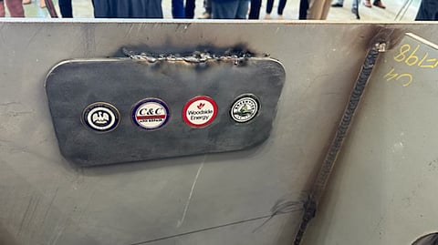 Coins welded onto the keel of one of the tugs C&C Marine and Repair Green Tug Towing