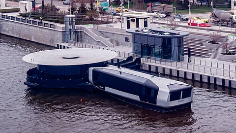 The new floating pier with a moored electric ferry