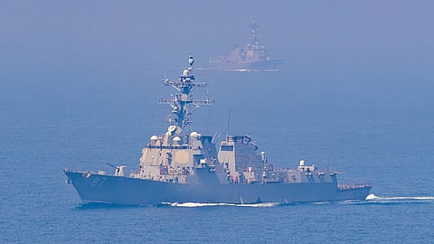 The US Navy Arleigh Burke-class guided-missile destroyer USS Mason (nearest to camera) and another Arleigh Burke-class destroyer underway in the Strait of Hormuz
