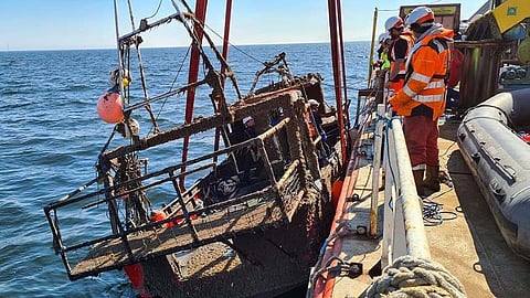 The wreckage of the fishing vessel Nicola Faith after being recovered from the seabed off the Welsh coast in June 2021