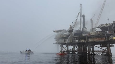 Two boats work to extinguish the fire on the non-operational gas platform Habitat off the coast of Santa Barbara, California, May 11, 2026.