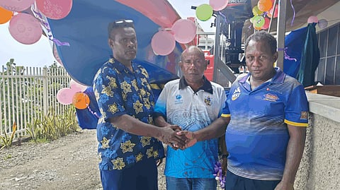 Wesley Garofe, Deputy Director for Aquaculture at the Solomon Islands Ministry of Fisheries and Marine Resources (left), at the formal handover of new outboard boats to Solomon Islands seaweed farmers, June 10, 2026