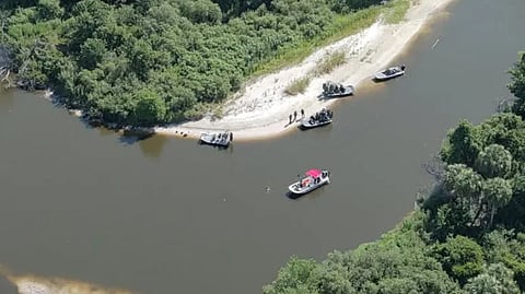 Emergency responders at the site of the capsizing, June 15, 2026