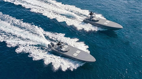 Renderings of outboard and waterjet-equipped examples of the USV