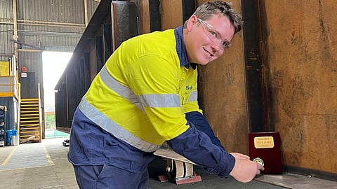 Placing of the coin during the keel-laying ceremony for a new cable ferry for the Daintree River ferry service