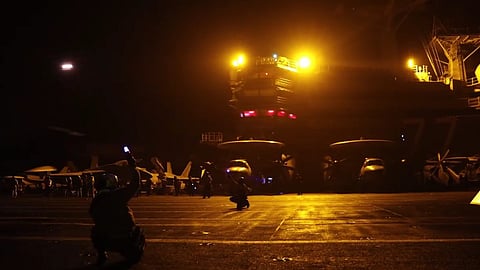 Fighter jets being launched from a US aircraft carrier as part on strike operations on Iran