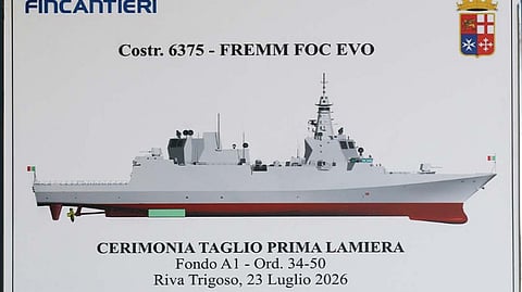 Photograph of poster taken during the steel-cutting ceremony for the Italian Navy's second FREMM EVO frigate, July 23, 2026