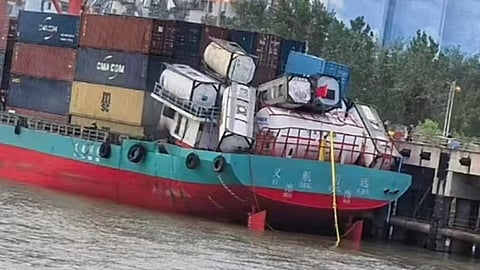 Photograph showing the damaged stern of the container vessel Yihang Mingyuan after it suffered an onboard explosion and a subsequent fire at the Port of Yangluo in China's Hubei province, July 22, 2026. One of the ship's crew remains unaccounted for as of July 23, 2026.