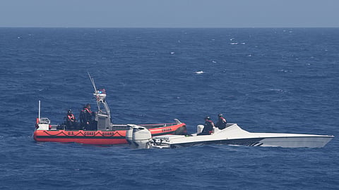 A small boat crew from the US Coast Guard fast response cutter USCGC Charles Sexton interdicts a suspected drug smuggling vessel approximately 80 miles southwest of Great Inagua, Bahamas, July 25, 2026. In coordination with the Royal Bahamas Defense Force, Sexton's crew seized approximately 2,380 pounds of presumptive marijuana worth an estimated US$2.8 million.