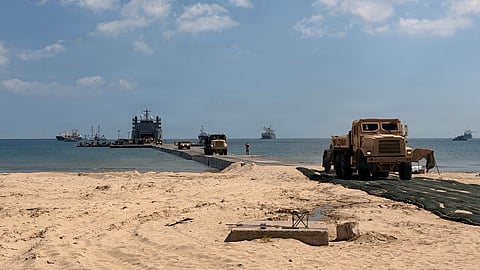 A US Army temporary pier system enables ship-to-shore offloading and provides a mooring point for US Coast Guard Port Security Unit 309’s 32-foot transportable port security boats at Yeongil Bay, Pohang, South Korea, during CJLOTS 26, July 13, 2026.