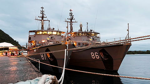 The Royal Australian Navy Huon-class mine countermeasures vessels HMAS Yarra and HMAS Diamantina berthed alongside Port Vila in Vanuatu during Operation Render Safe 26-2