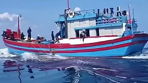 An illegal fishing vessel intercepted by Philippine forces near Thitu Island in the South China Sea