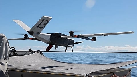 Aerial drone taking off from a boat