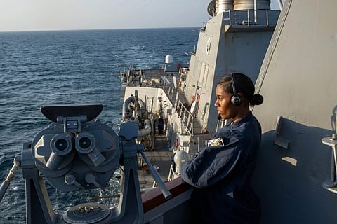 Boatswain's Mate Seaman Amiah Rose stands watch on the bridge wing of the Arleigh Burke-class guided-missile destroyer USS Mason while the ship operates in support of Operation Prosperity Guardian (OPG) in the Red Sea, January 3, 2024. Led by Combined Task Force 153 of Combined Maritime Forces, OPG is an international effort seeking to address maritime security challenges in the southern Red Sea and the Gulf of Aden, with the goal of ensuring freedom of navigation for all countries and bolstering regional security. (Photo: US Navy/Mass Communication Specialist 1st Class Chris Krucke)