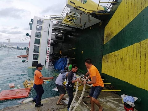 Ferry tilts on side during unloading in Cebu, Philippines