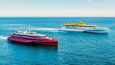 Queen Beetle sails alongside Bajamar Express, another Austal-built trimaran ferry (Photo: Austal Australia)