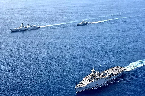 INS Jalashwa (lower right) and two other Indian Navy ships sailing for Male, Maldives, as part of Operation Samudra Setu (Photo: Indian Navy)