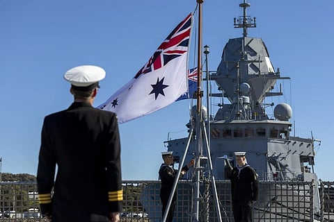 Lowering the Australian white ensign for the last time on HMAS Anzac during the ship's decommissioning ceremony held at HMAS Stirling, Western Australia, May 18, 2024 (Photo: Australian Department of Defence/Ernesto Sanchez)