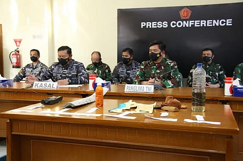 Indonesian Navy chief of staff Admiral Yudo Margono (left) and Indonesian National Armed Forces commander Air Chief Marshal Hadi Tjahjanto present some of the recovered debris believed to have originated from the missing submarine KRI Nanggala during a press conference on April 24, 2021. The submarine went missing three days earlier while conducting drills in the Bali Strait 100 kilometres off Bali. (Photo: Indonesian National Armed Forces Information Centre official Facebook page)