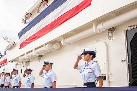 The crew of the US Coast Guard cutter Fredrick Hatch salute during a rare triple-commissioning ceremony at Coast Guard Sector Guam on July 29, 2021. (Photo: US Coast Guard/Petty Officer 1st Class Travis Magee)