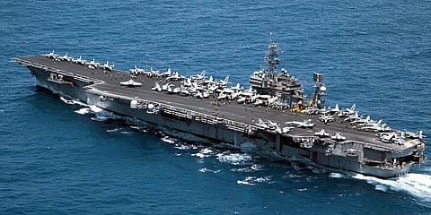 The US Navy aircraft carrier USS Kitty Hawk underway in the Philippine Sea on May 7, 2004 (Photo: US Navy/Photographer's Mate 2nd Class William H. Ramsey)