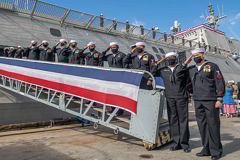 Sailors assigned to the Independence-variant littoral combat ship USS Savannah man the rails during its commissioning ceremony on February 5, 2022. (Photo: US Navy/Petty Officer 2nd Class James Hong)