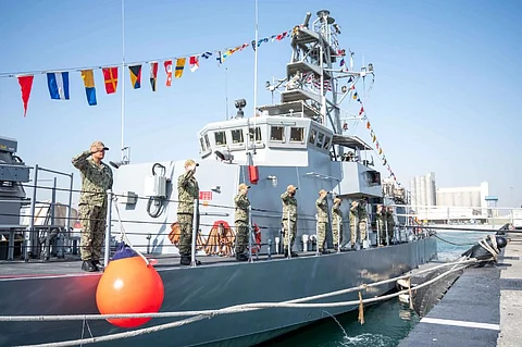 US Navy sailors assigned to the coastal patrol craft USS Firebolt salute during the ship's decommissioning ceremony, February 23, 2022, at Naval Support Activity Bahrain. (Photo: US Navy/Mass Communication Specialist 1st Class Mark Thomas Mahmod)