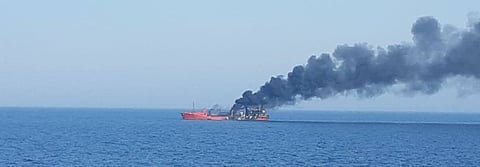 A foreign-flagged commercial vessel catches fire after reportedly being hit by a rocket claimed to be of Russian origin in the waters off Ukraine's southern coast on February 25, 2022. (Photo: Ukrainian Ministry of Defence)