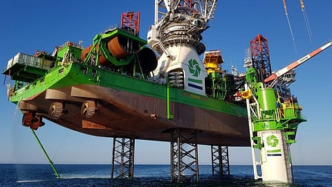 A monopile drilling, installation and grouting system (MODIGA) being deployed from a DEME installation vessel (Photo: Vuyk Engineering Rotterdam)