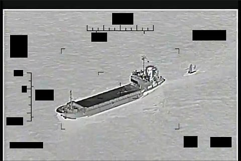 Screenshot of a video showing the support ship Shahid Baziar, left, from Iran's Islamic Revolutionary Guard Corps Navy unlawfully towing a Saildrone Explorer unmanned surface vessel in international waters of the Arabian Gulf, August 30, 2022. (Photo: US Navy)