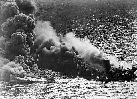 The civilian oil tanker Dixie Arrow breaks apart after being hit by a German torpedo somewhere in the Atlantic Ocean, March 26, 1942. (Photo: US Navy)