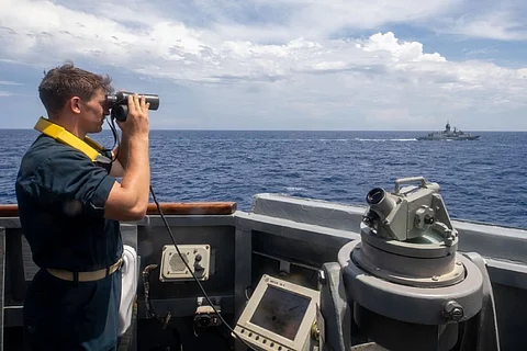 The US Navy guided-missile destroyer USS Chung-Hoon sails alongside the Royal Australian Navy frigate HMAS Anzac during Surface Action Group operations as a part of exercise “Noble Dingo,” May 20, 2023. (Photo: US Navy/Mass Communication Specialist 1st Class Andre T. Richard)
