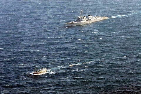 The US Navy Arleigh Burke-class guided missile destroyer USS Winston S. Churchill follows a suspected pirate vessel in the Indian Ocean, January 20, 2006. (Photo: US National Archives)