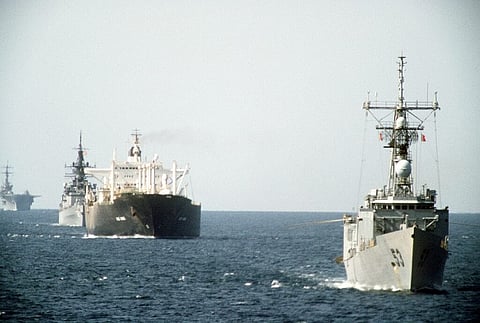The commercial tanker Gas King with escorting US Navy ships underway in the Persian Gulf, October 21, 1987. The US Navy ships are providing escort as part of Operation Earnest Will, which sought to deter attacks on Kuwaiti-owned tankers by Iranian military and paramilitary forces. (Photo: US Navy)