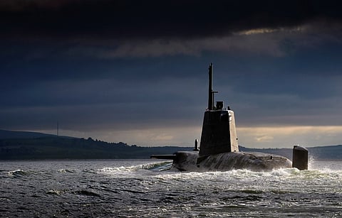 The Royal Navy Astute-class nuclear-powered attack submarine HMS Ambush returns to HMNB Clyde in Scotland, July 15, 2013. (Photo: UK Ministry of Defence/CPOA(Phot) Thomas McDonald)
