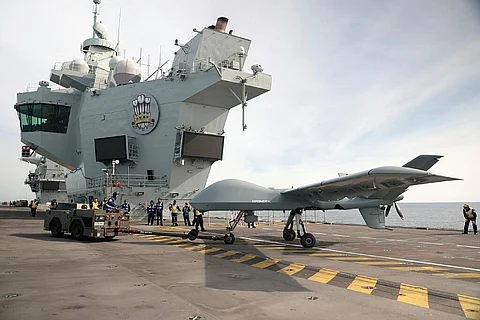 A Mojave unmanned aerial vehicle is being prepared for trials on the flight deck of the Royal Navy aircraft carrier HMS Prince of Wales, November 15, 2023. (Photo: UK Ministry of Defence)