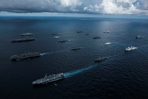 US Navy, US Coast Guard, Royal Australian Navy, Royal Canadian Navy, and Japan Maritime Self Defence Force ships sail together in formation in the Coral Sea during Exercise Talisman Sabre 2019. (Photo: US Navy/Petty Officer 2nd Class Kaila Peters)