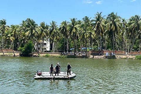 Indian Navy divers assist in search and recovery operations in the waters of Kerala's Malappuram district after an overloaded tour boat capsized in the area on May 7, 2023. The incident left at least 22 people dead. (Photo: Indian Navy)