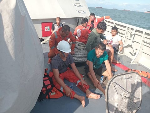 Some of the rescued crew of the product tanker Ratu Yamani after it was rocked by explosions in South Kalimantan, Indonesia, on July 12, 2023. The sailors were rescued by the crew of an Indonesian Navy patrol boat that was also in the area. (Photo: Indonesian Navy)