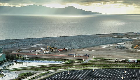 Stockpiles of locally sourced rock to be used in the construction of a new rock wall at the Port of Townsville