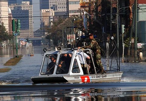 A US Coast Guard air boat navigates the flooded streets of New Orleans