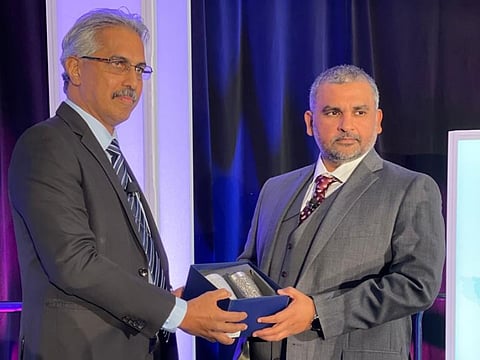 Capt Saif Al Mheiri, Managing Director of Abu Dhabi Maritime, and the head of AD Ports Group’s delegation at IAPH2022 in Vancouver, (right), receiving a gift from the President of IAPH, Capt Subramaniam Karuppiah, in recognition of Abu Dhabi being named as the host city for IAPH2023. (Photo: AD Ports Group)