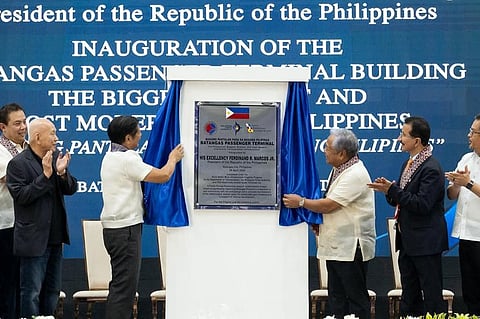 Philippine President Ferdinand Marcos Jr. (third from left) unveils the marker indicating the completion of the modernisation of the Batangas Passenger Terminal at the Philippines' Port of Batangas, April 26, 2024.